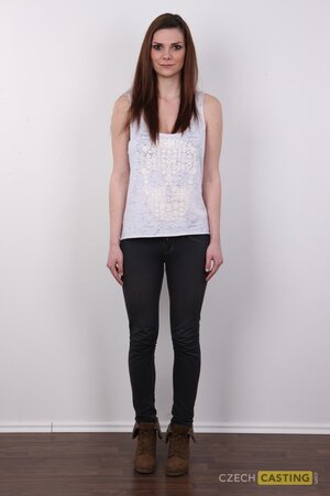 Horny lady named Karolina shows her big boobs and firm ass