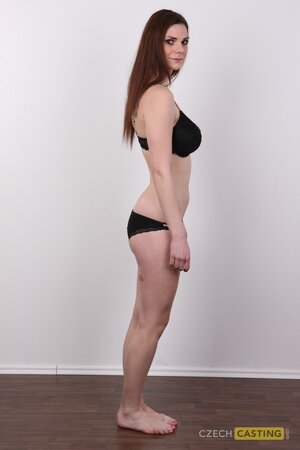 Horny lady named Karolina shows her big boobs and firm ass