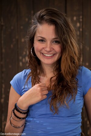 The girl struts her stuff while fully aroused in a BDSM scene