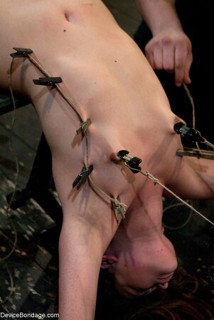 The girl struts her stuff while fully aroused in a BDSM scene