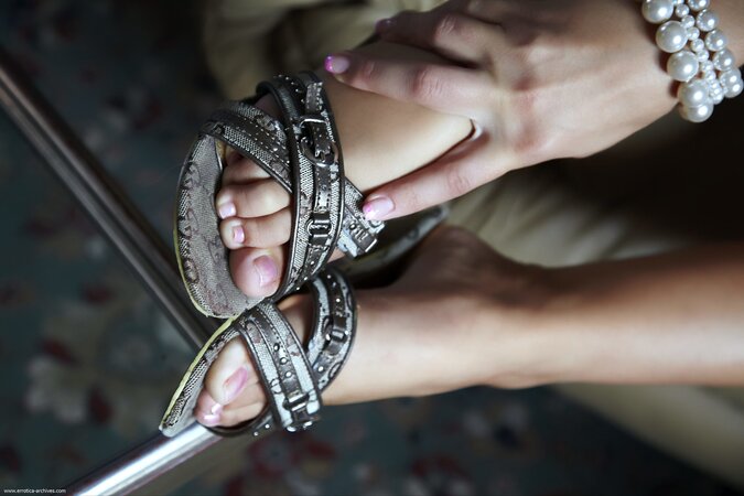 Her oval face is framed by thin eyebrows and perky ears