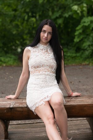 Adorable brunette Veronica Snezna shows her boobs while outside