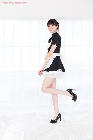 Asian maid with sexy legs and a firm ass is here to tease