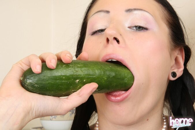 Big boobs brunette fucking herself with a sexy cucumber big time
