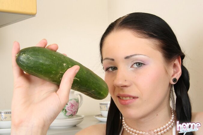 Big boobs brunette fucking herself with a sexy cucumber big time