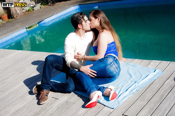 Cathy Heaven removes jeans for a poolside fuck