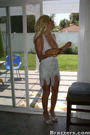 Brittany Andrews enjoys getting her huge tits creamed