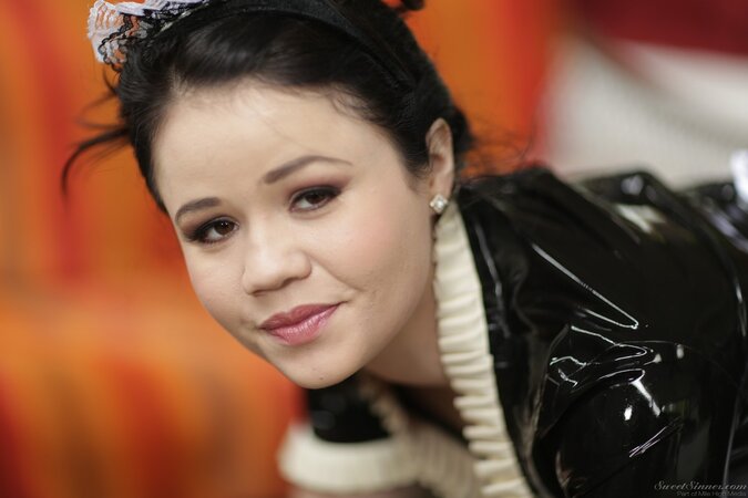 Yhivi blows a big dick and gets fucked on the table in latex