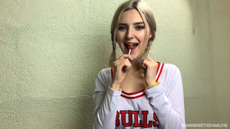 Eva Elfie licks a lollipop and a dick while exposing her big tits to Adam Ocelot