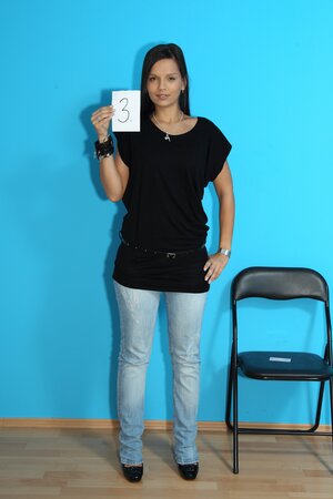 Eve Angel undresses and poses at a casting