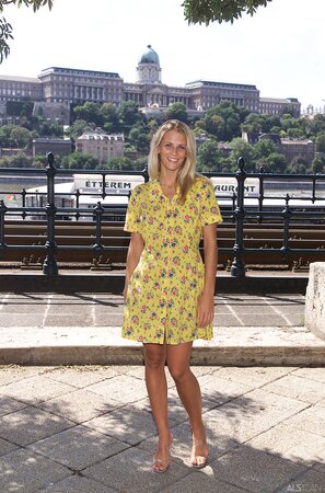 Blonde Krisztina enjoys an outdoor session