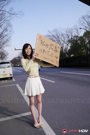 Shiori Yamate reveals her hot breasts and sucks a cock in a car