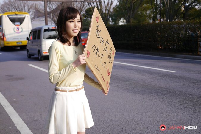 Shiori Yamate reveals her hot breasts and sucks a cock in a car