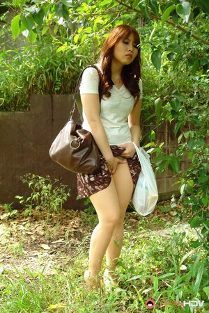 Asian babe Eri Makino gets fucked outdoors and plays with her big juggs