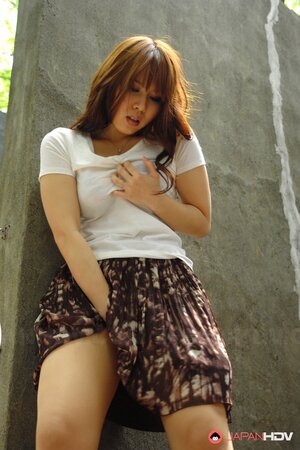 Asian babe Eri Makino gets fucked outdoors and plays with her big juggs