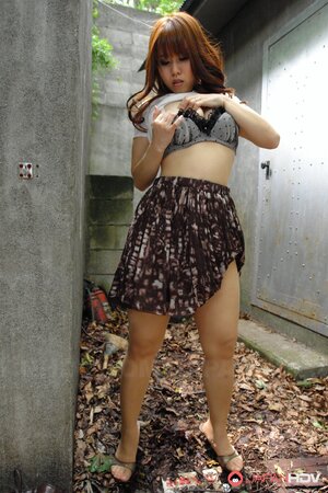 Asian babe Eri Makino gets fucked outdoors and plays with her big juggs