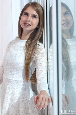 Rina takes off her pretty dress to model with no clothes on