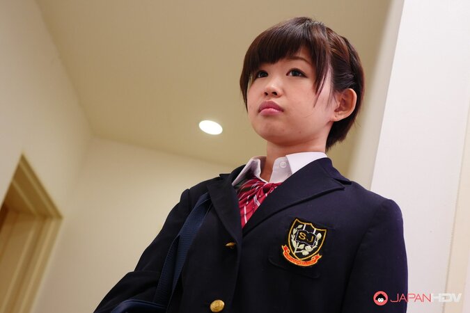 Naughty Asian schoolgirl Kaho Miyazaki gives a blowjob in class