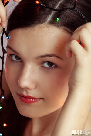 Iva Rogned gets naked and wraps herself in mini lights