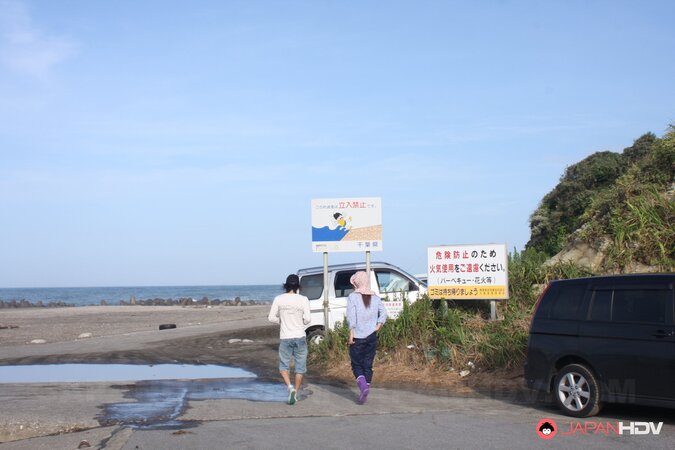 Japanese girl gets pleasured through her pants in rubber boots