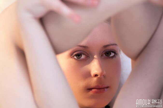 Sabrina Rose gets totally naked on her bed in a tempting manner