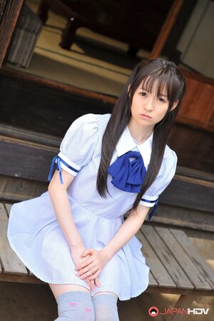 Ai Uehara shows off her hairy pussy on the balcony