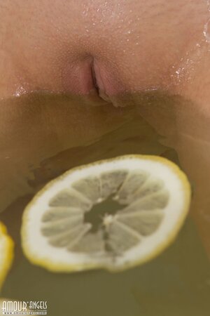 Cute blonde teen Veronika Lindnerova enjoys a lemon slice bath naked