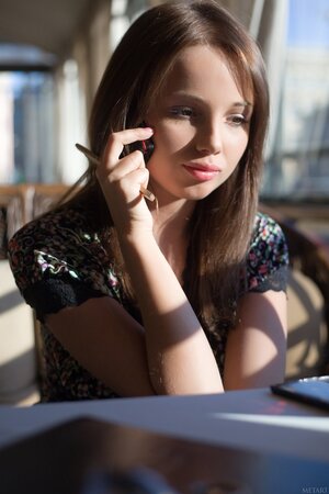 Adorable teen Michaela A enjoys exposing her vagina in a solo