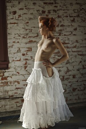 Sally A shows off her beauty in a Met Art gallery