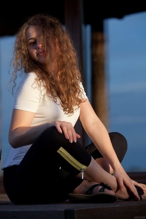 Wanda A exposes her hairy pussy and her nice ass after stripping