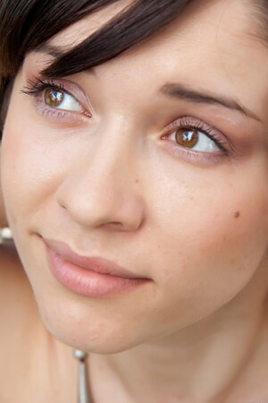 Katy C shows off her fantastic tits outdoors while naked