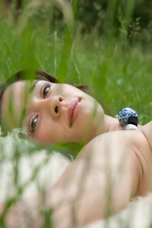 Katy C shows off her fantastic tits outdoors while naked