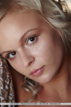 Blonde teen Gia C shows off her sexy pussy in a hot album