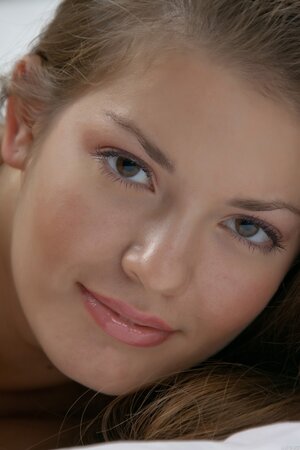 Breathtaking teen Sabina B shows off her fantastic body and trimmed cunt in a solo pose