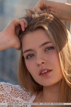 Adorable blonde sweetheart Sigrid unveils her tight cunt