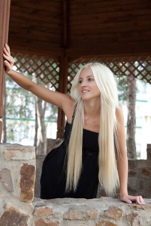 Alysha A displays her glamour in a solo Met Art performance