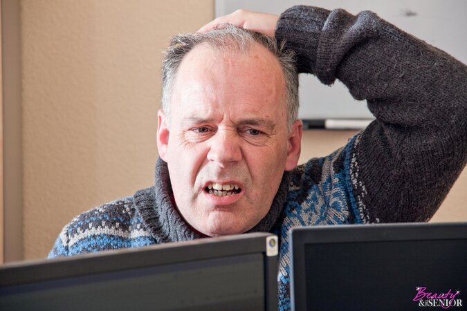 Blue-eyed brunette is having sex in the office with an old lad