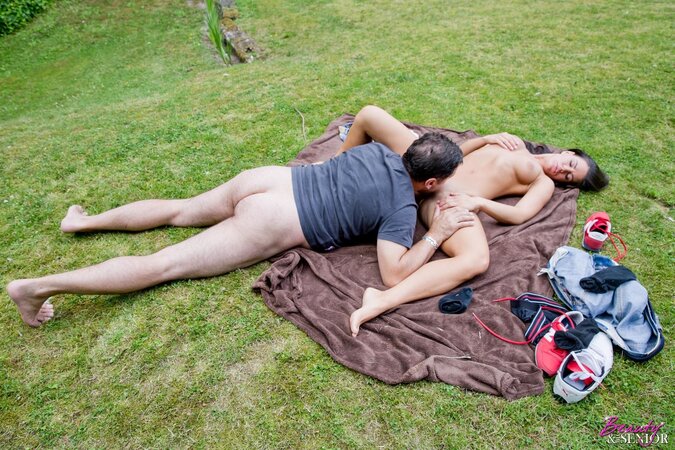 Teen girl and her old lover are screwing hard on a blanket