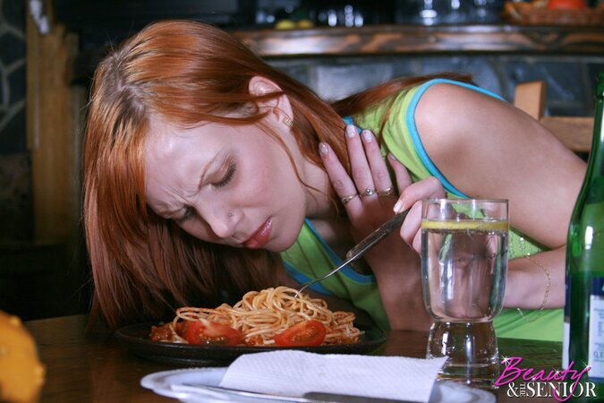 Redheaded babe Electra Angel fucks an older man after dinner