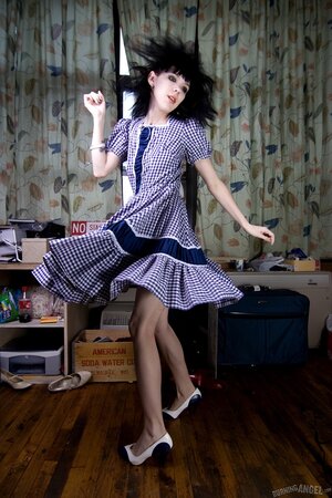 Sexy babe with a petite body takes her clothes off on camera