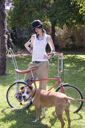 Melodie Gore rides a bike and gets naked in public