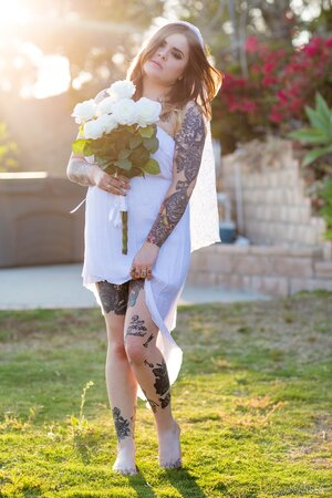 Bride with amazing curves and lots of ink slowly gets naked