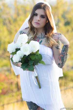 Bride with amazing curves and lots of ink slowly gets naked