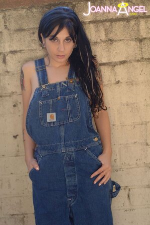 Punk babe Joanna Angel reveals her boobs before stripping