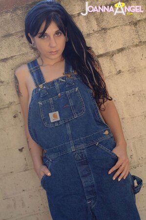 Punk babe Joanna Angel reveals her boobs before stripping