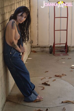 Punk babe Joanna Angel reveals her boobs before stripping