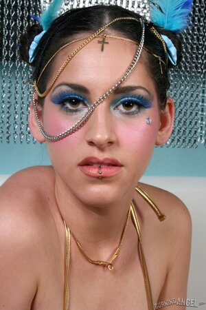 Big-titted brunette bombshell reveals her big natural boobs on camera