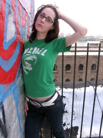 Nerdy girl with small boobs and glasses looks adorable nude