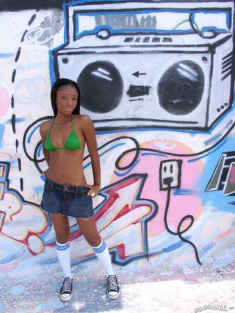 Petite ebony fetish girl displays her sweet small tits and awesome tiny ass