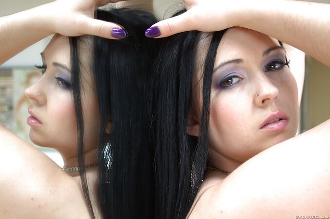 Tempting brunette in a sexy thong has an ass to be proud of